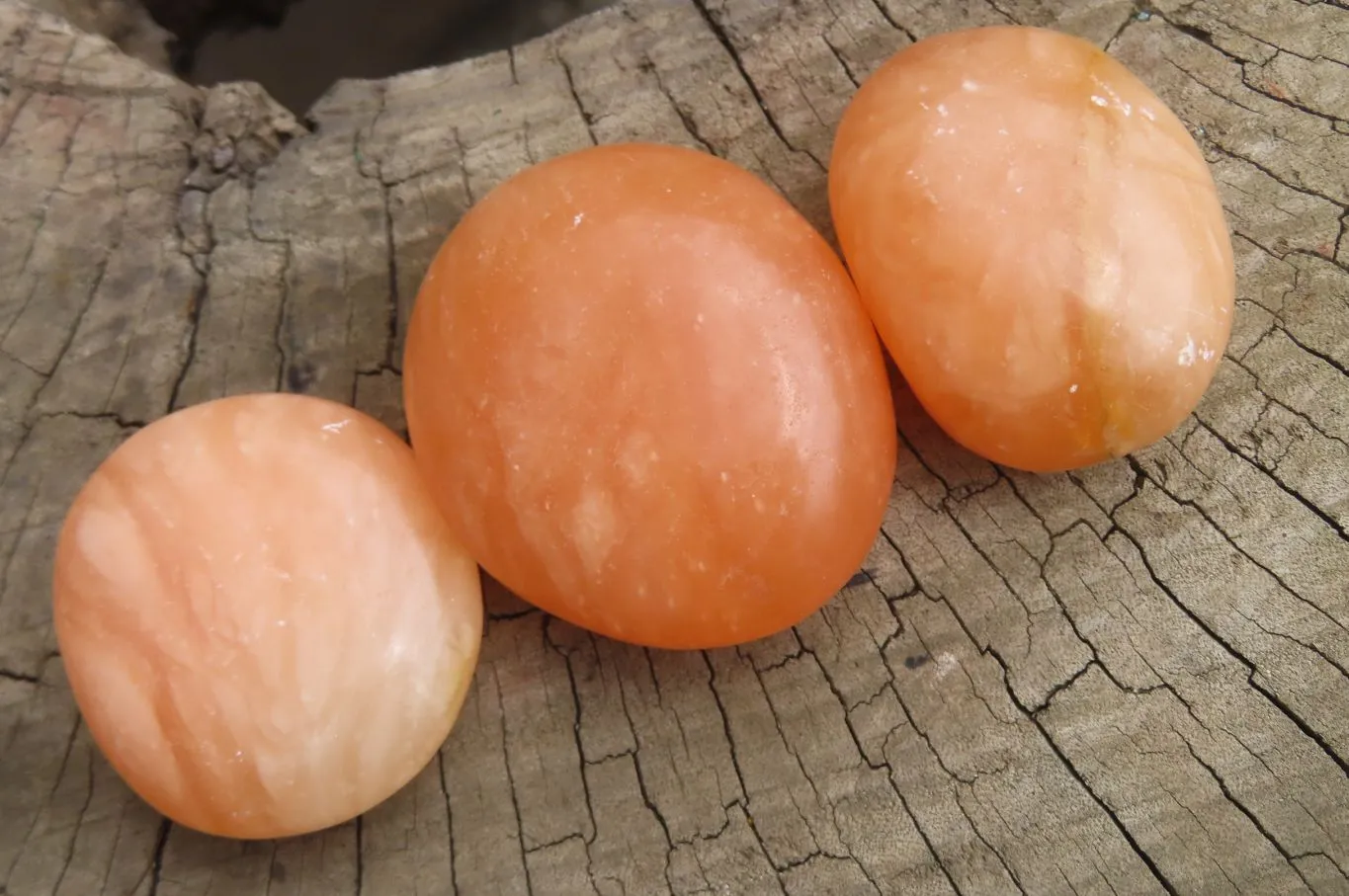 Polished Orange Twist Calcite Palm Stones x 20 From Madagascar